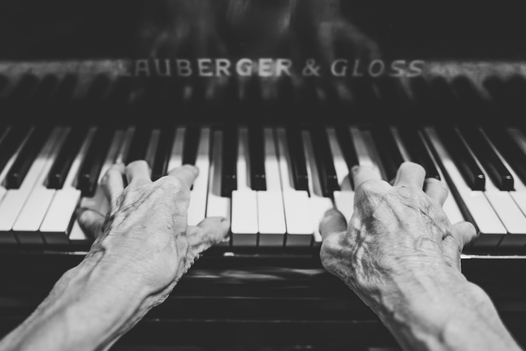 Old Man Playing Piano